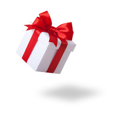 Gift box, present over white background. White gift box with red ribbon bow, isolated on white