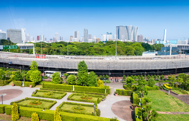 Obraz premium Buildings and parks of Tokyo from subway train