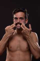 Fototapeta premium crazy young man hands mouth open