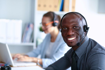 Portrait of an African American young business man with headset