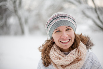 Attractive young woman in wintertime outdoor