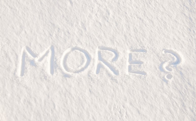 More? - written in snow, concept of being tired of cold weather and snow