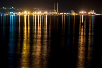 city reflection on night sea