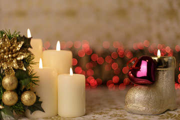 Greeting card with Christmas tree, candles, lights and heart decoration.