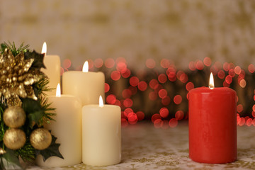 Greeting card with Christmas tree, candles, lights and heart decoration.