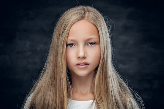Portrait of pretty girl with long blonde hair. Beautiful caucasian