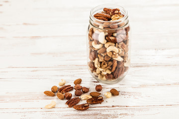 Mix of different nuts closeup photo