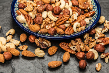 Mix of different nuts closeup photo