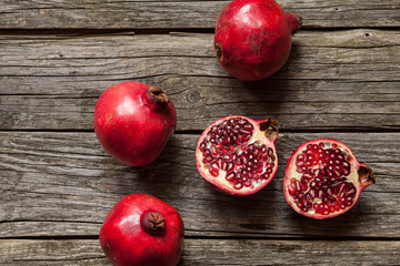 Pomegranates on wooden table