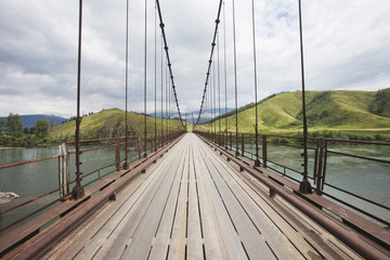 Fototapeta na wymiar Katun river Bridge near Multa village. Altai
