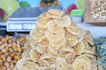 a pile of dried pineapple pieces