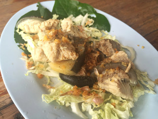 horizontal photo of steamed Mekong giant catfish with vegetables