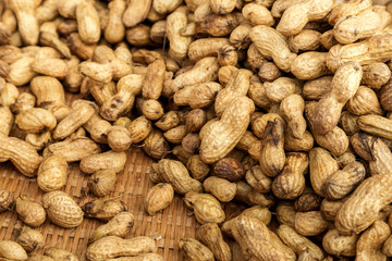 organic boiled peanuts on bamboo basket sold in the market