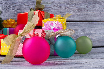 Beautiful bright Christmas balls with bows.