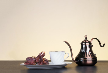 Traditional arabic tea set and dried dates