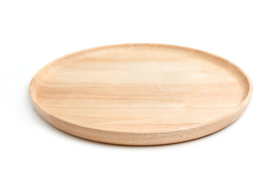 Empty round wooden plate isolated on white background