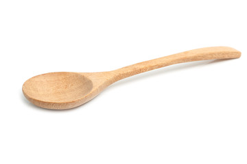 Wooden spoon isolated on a white background