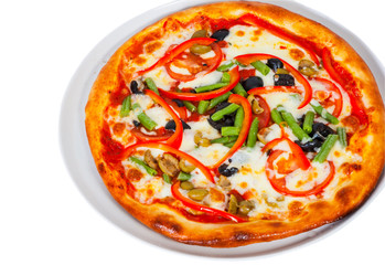 vegetarian pizza with vegetableson a white plate. isolated on white. top view