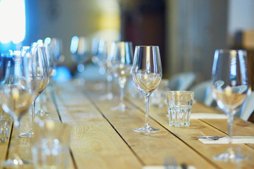 Row of wine glasses on the table in restaurant