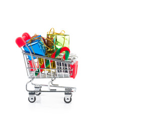shopping cart with gift boxes isolated on white