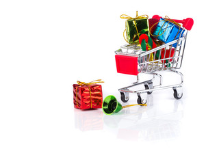 shopping cart with gift boxes isolated on white