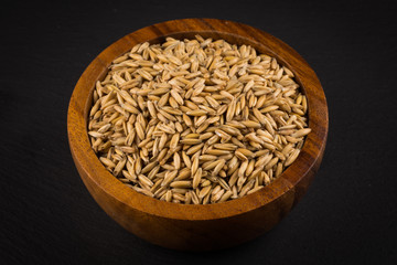 natural oat grains background, closeup