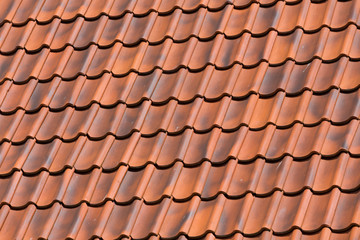 Red tiles roof background