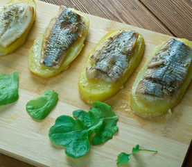 Eel with baked potatoes