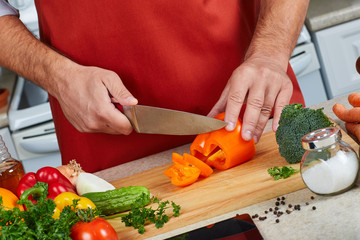Chef man cooking in the kitchen.