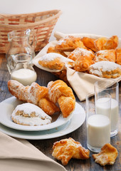 Sweet pies, jug and glasses with milk in style a rustic