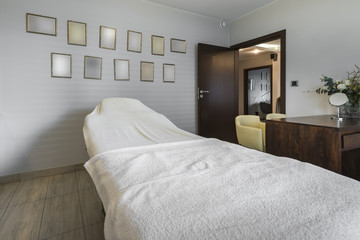 Massage room interior in wellness center
