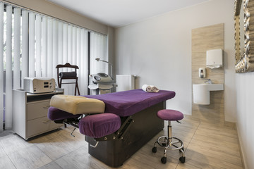 Massage room interior in wellness center