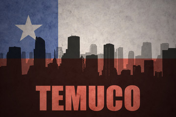 abstract silhouette of the city with text Temuco at the vintage chilean flag