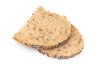 White bread sliced wholegrain bread on a wooden table.