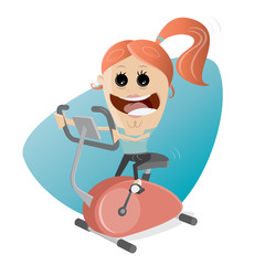 happy girl training on indoor bike trainer