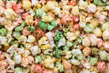 Colored Popcorn texture background. Sweet popcorn.