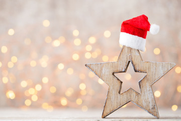 Christmas decor with santa hat. Vintages background.