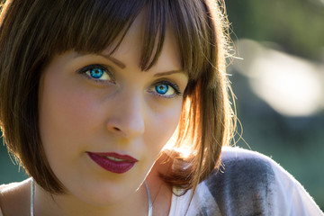 beautiful blue-eyed girl in the park