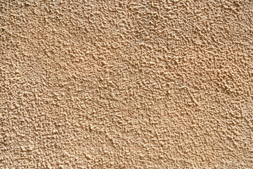 Текстура фактурной бежевой штукат