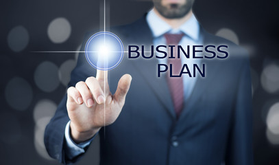 Businessman hand pushing business graph