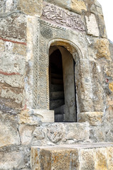 Fototapeta na wymiar Door archaeological site minarets with inscriptions in Arabic city Bolgar