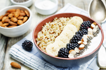 Fototapeta na wymiar Greek yogurt almond banana Chia seeds Quinoa blackberry breakfas