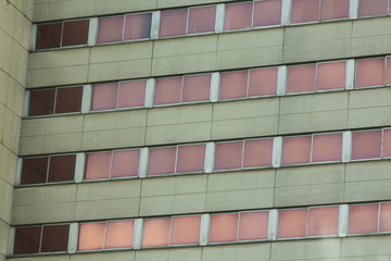 Picture of old building with many windows. Retro building with many offices. Background.