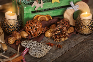 Beautiful composition of natural Christmas decor on wooden background