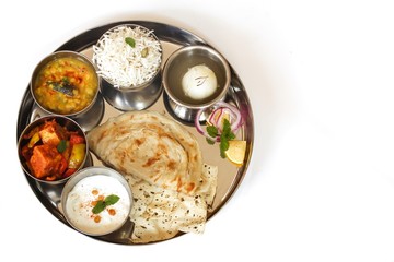 Indian vegetarian Thali isolated on white, top down view