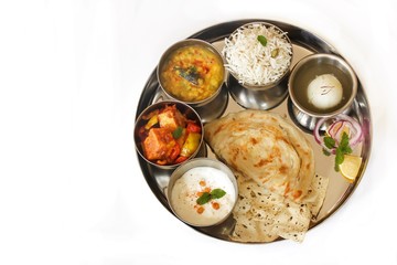 Indian vegetarian Thali isolated on white, top down view