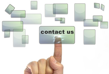 Obraz premium Businessman hand pushing on a touch screen interface on contact us button