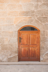 Wooden front door of a home