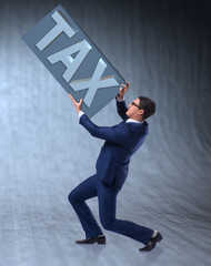 Businessman struggling with high taxes