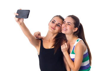 Obraz na płótnie Canvas Two young women making selfie